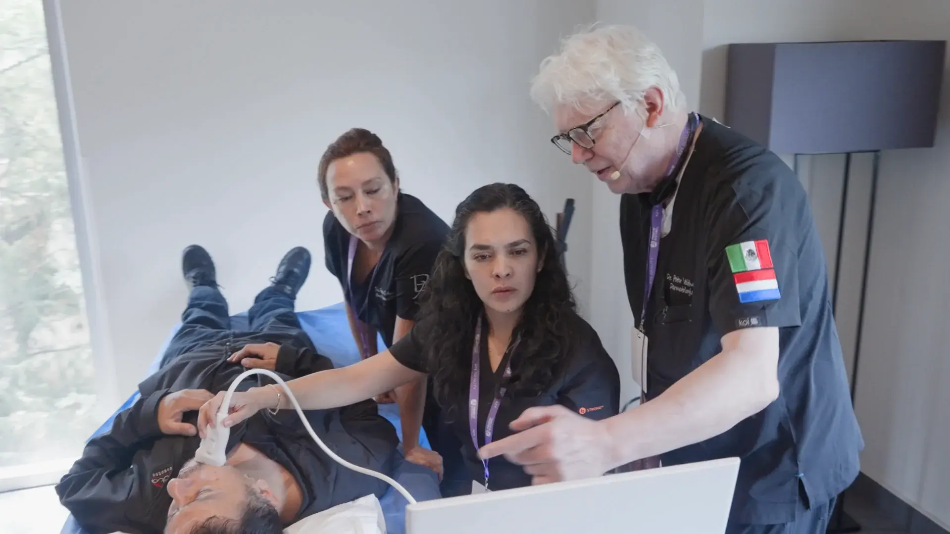 Instructors reviewing the image on the device